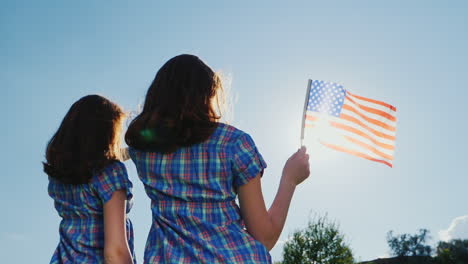 Two-Young-Women-With-The-American-Flag