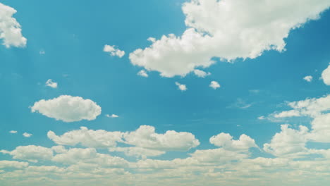 Blue-Sky-With-White-Clouds-And-Sun-Rays