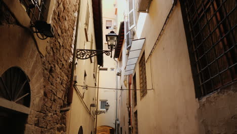 An-Original-Narrow-Street-With-Old-Houses-In-The-Historic-Part-Of-Florence