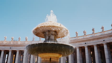 Steadicam-Shot:-The-Famous-Fountain-Of-San-Pietro-Italian-Square-With-Saint-Peter-Church-Columns-In-Rome-Italy