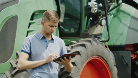 A-Young-Caucasian-Farmer-Is-Working-In-The-Field-With-A-Tablet-4