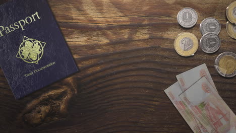 Travel-passport-and-money-on-wood